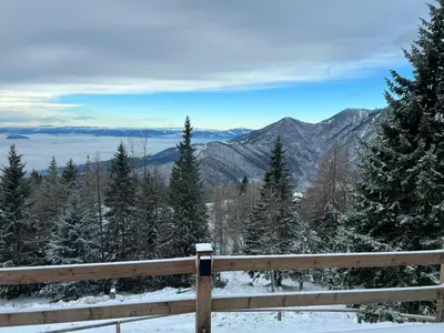 a view from the top of a mountain in the snow at Luxury Chalet & Sauna Kati - Velika Planina - I Feel Alps in Stahovica