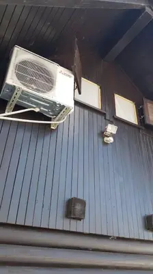 a roof of a house with a fan and windows at Chalet Kujavnk in Kranj