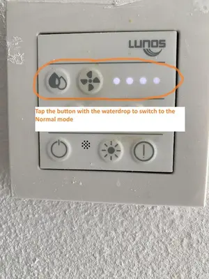 a video game controller with a sign that says top the button with the weatherdrop at Lavender in Postojna