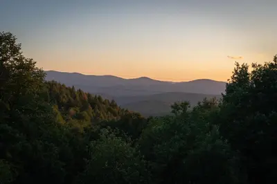 a view of the mountains from the forest at sunset at Johanca in Obrov