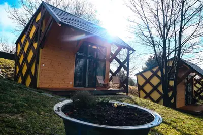 a tiny house on a hill with a planter at Apartments Kr'Bee in Mala Nedelja
