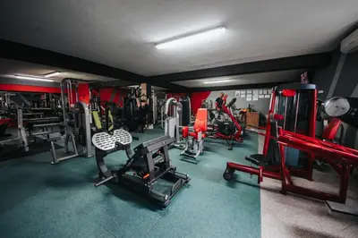 a gym with lots of equipment in a room at Luxury Residence Metlika in Metlika
