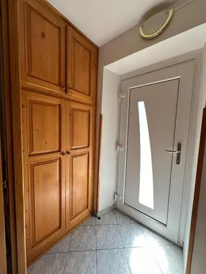 a room with a door and a window and a tile floor at Apartma Mimi in Bovec