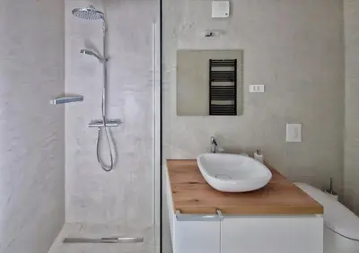 a bathroom with a sink and a shower at Hiša Oblak in Gozd Martuljek