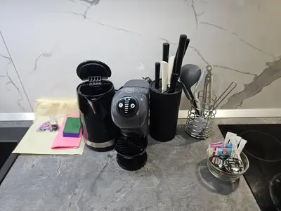 a coffee maker sitting on top of a table at Zeleni Biser -Terme Čatež in Čatež ob Savi