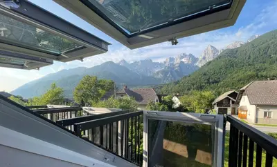 a balcony with a view of mountains at Walter Apartments in Gozd Martuljek