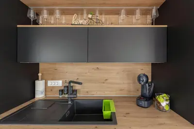 a kitchen with a sink and a counter top at Apartment Božica in Ljubljana