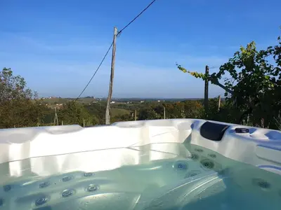 a jacuzzi tub sitting on top of a house at Paulusberg Comfortable holiday residence in Ivanjkovci