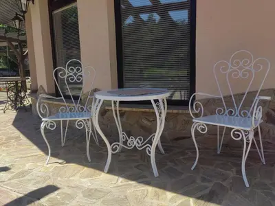 two chairs and a table and a table and chairs at WoW sleeping in Miklavž na Dravskem Polju