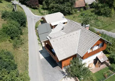 an overhead view of a house with a road at Apartment Etjan in Zgornje Gorje