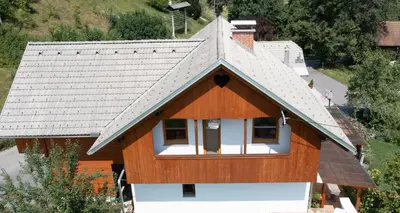 an overhead view of a house with a roof at Apartment Etjan in Zgornje Gorje