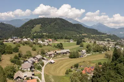 an aerial view of a village in the mountains at Apartment Etjan in Zgornje Gorje