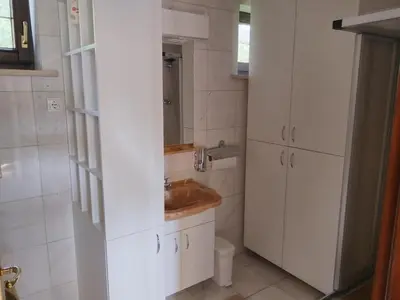 a bathroom with a sink and a toilet at apartma Grad in Motnik
