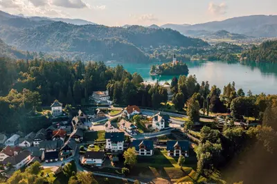 an aerial view of a village on a lake at Mlino Alpino in Bled