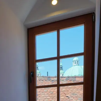 a window with a view of a building at Apartments Metro 7 in Ljubljana