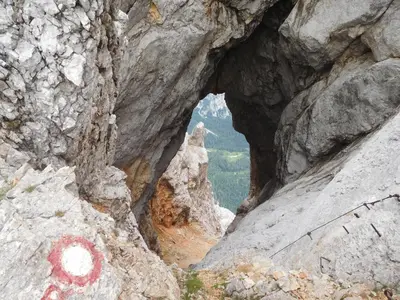a cave in the side of a rocky mountain at Apartment Studio MY RESIDENCE in the city center in Ljubljana