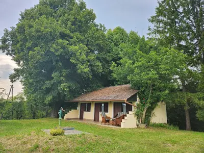 a small house in the middle of a field at Hiša Heidi in Zavrč