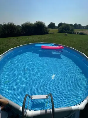 a large swimming pool with a frisbee on it at Močvirski Tulipan in Ljubljana