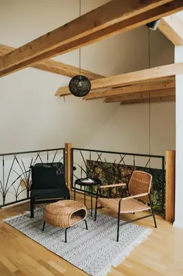 a living room with a couch and a table at Riverside House Krka in Zagradec