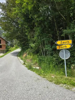 a street sign on the side of a road at Lisičja bajta in Stahovica