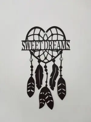 a heart shaped dream catcher with the wordsswept hearts at Dream home apartment in Koper