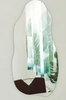 a mirror with a reflection of a building at Dream home apartment in Koper