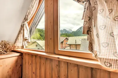 a window with a view of a mountain at Chalet Vitranc in Kranjska Gora