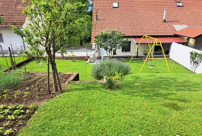 a yard with a playground in a house at Studio Sofia in Rakek