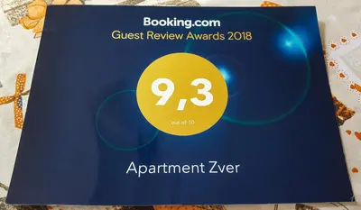 a blue card with a yellow number on it at Rooms with shared kitchen Zver, great for hikers in Hudajužna