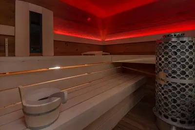 a sauna with a red light in the middle at Gostilna Lipan in Gorenja Vas