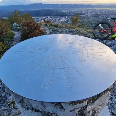 a blue table on top of a mountain with a view at Josef apartment, CENTER in Solkan