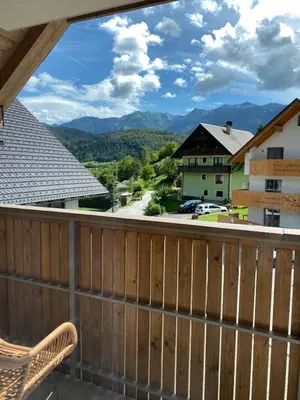 a balcony with a view of the mountains at Lux in Bohinj in Bohinj