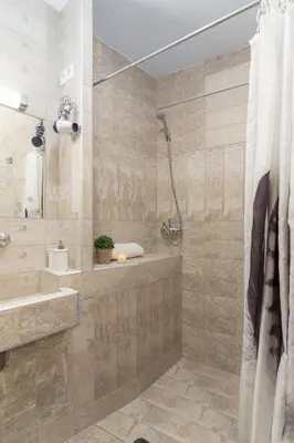 a bathroom with a shower and a sink at Apartma Bohinj in Bohinj
