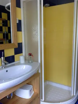 a bathroom with a sink and a shower at Your Ljubljana Home in Ljubljana