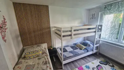 a small room with two bunk beds in it at Simona's place-Free private parking in Ljubljana