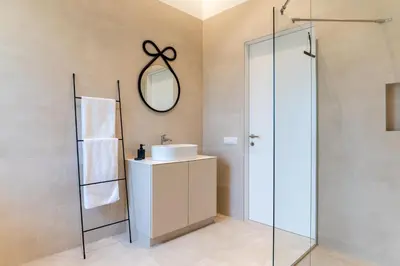 a bathroom with a sink and a mirror at Villa Elizabeth - Apartment with Garden in Slovenj Gradec