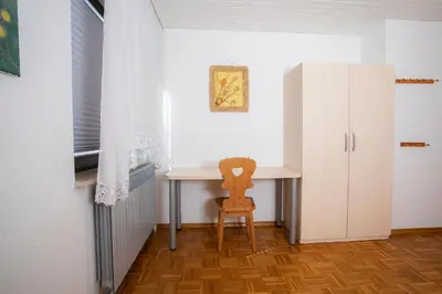 a small room with a desk and a chair at Apartment Harmony Bled in Bled
