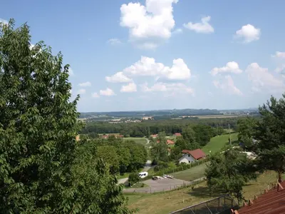 an overhead view of a town with trees and houses at Apartment VISOTA in Ptuj