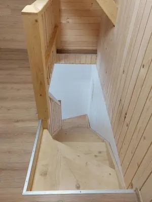 an overhead view of a tiny house with wooden floors at Honey house in Zgornje Gorje