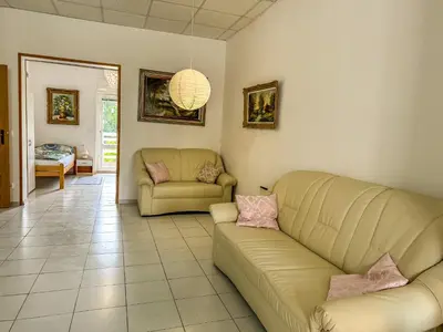 a living room with two couches and a couch at Apartmaji Vogelnik in Radovljica