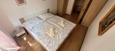 an overhead view of a bed in a bedroom at Apartma Brin in Bovec