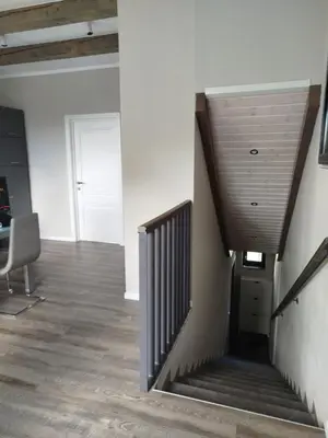 an empty room with a staircase in a building at DEKO-LIME apartments in Ljubljana