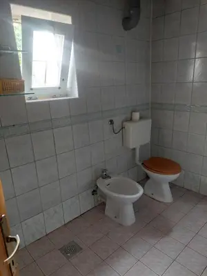 a bathroom with a toilet and a bidet at Apartment ML FREE PARKING in Loče pri Poljčanah