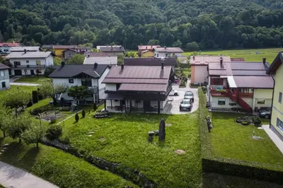 an aerial view of a small town with houses at Hiša Krn in Kobarid
