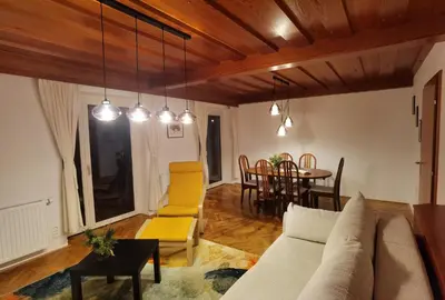 a living room with a couch and a table at Apartma Žerjav in Kranjska Gora