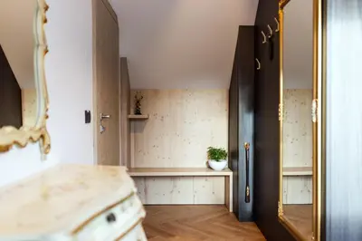 a small kitchen with a sink and a counter at Hotel Julian Alps in Zgornje Gorje