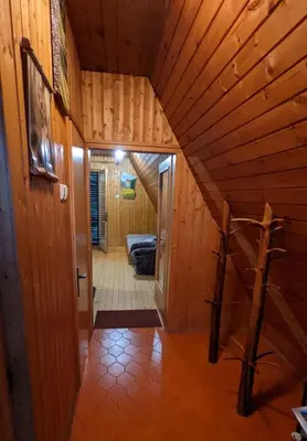 an overhead view of a hallway in a wooden house at Cottage Koča Oaza Preske in Jurklošter