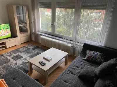 a living room with a couch and a coffee table at Janko's house in Maribor
