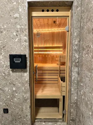 a sauna is shown in a stone wall at Riverstone Retreat Bovec in Bovec
