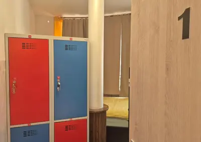 a room with two lockers with the number one at Bled Lesce station rooms and depo in Lesce